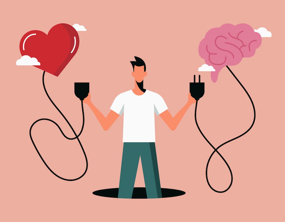 Un homme qui relie le coeur et le cerveau pour montrer qu'avec son corps il utilise son Intelligence Emotionnelle.